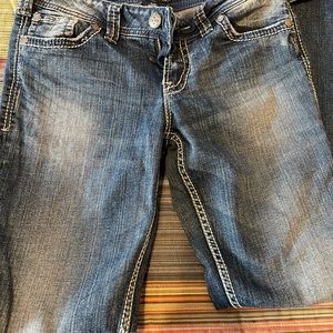 Silver Suki surplus rose boot cut. Size 29, length 30. Black flap pockets.